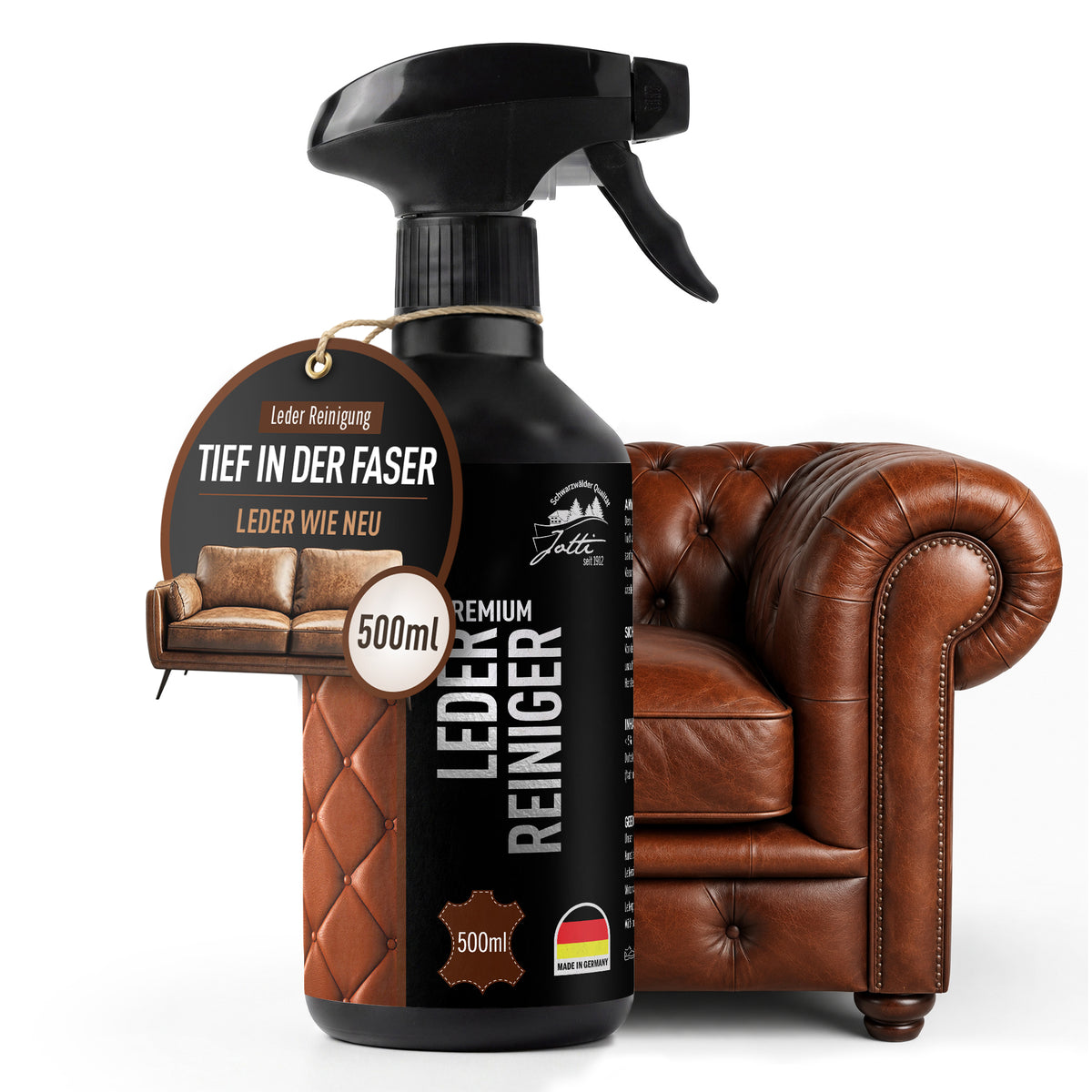 Jotti Lederreiniger 500 ml Sprühflasche vor braunem Chesterfield-Sessel
